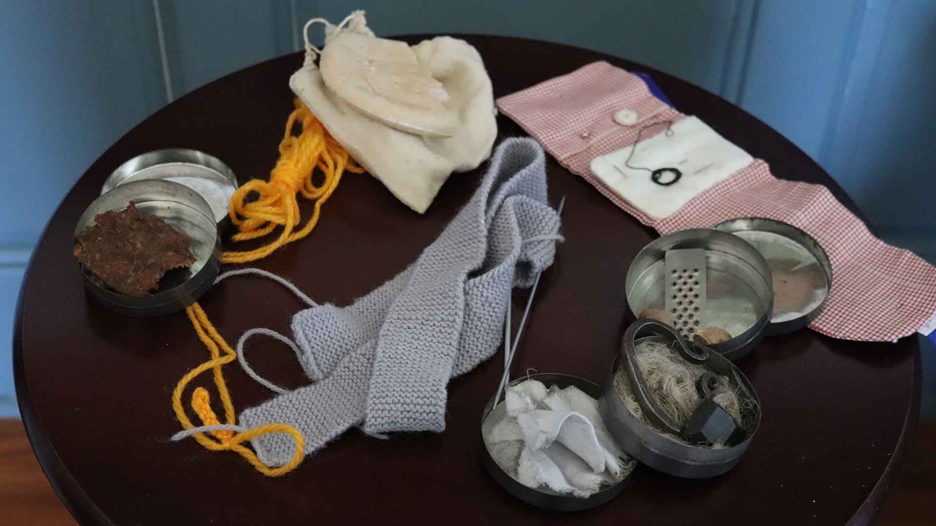 display of colonial era sewing items