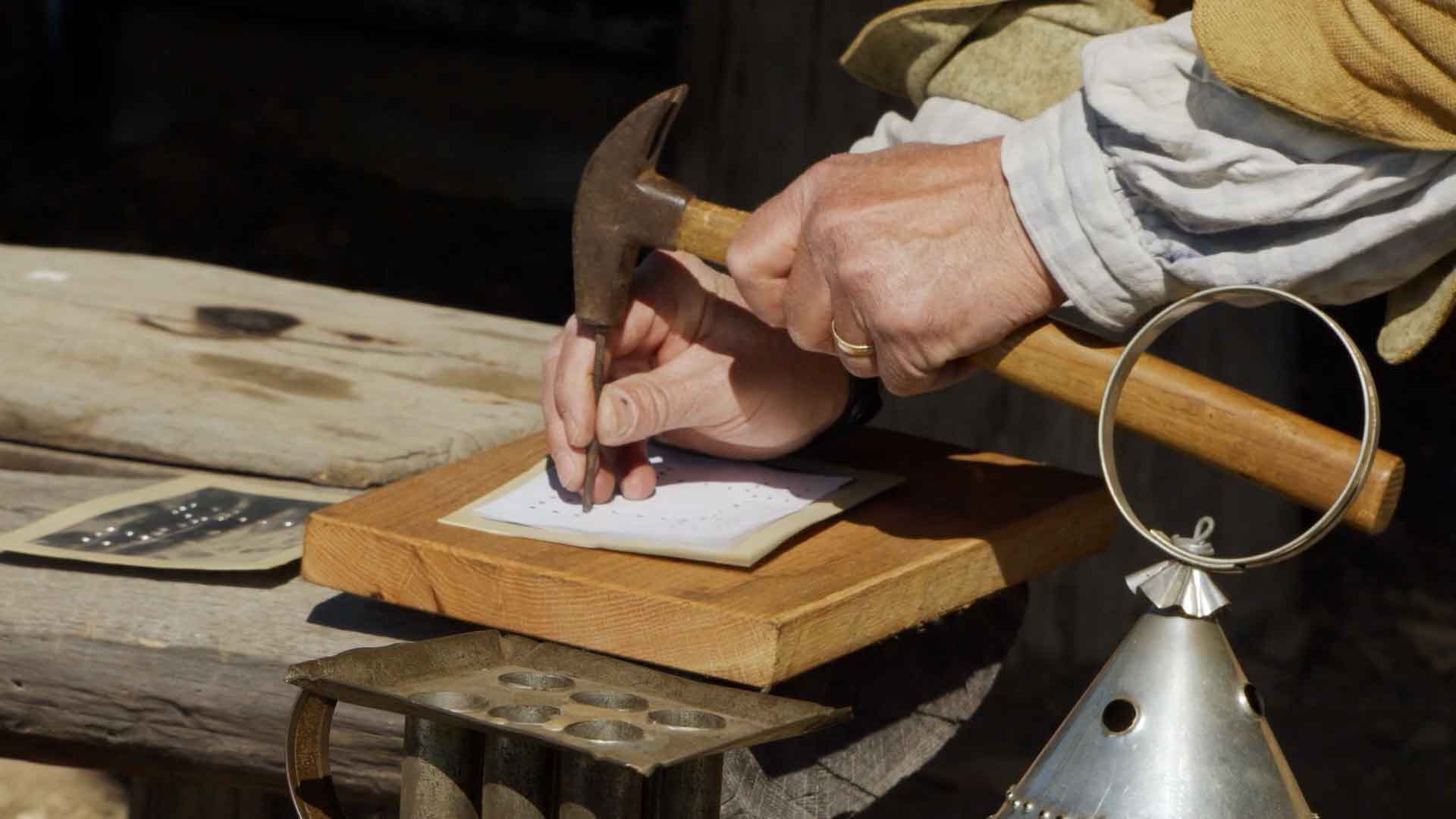 tin punching with hammer and tail