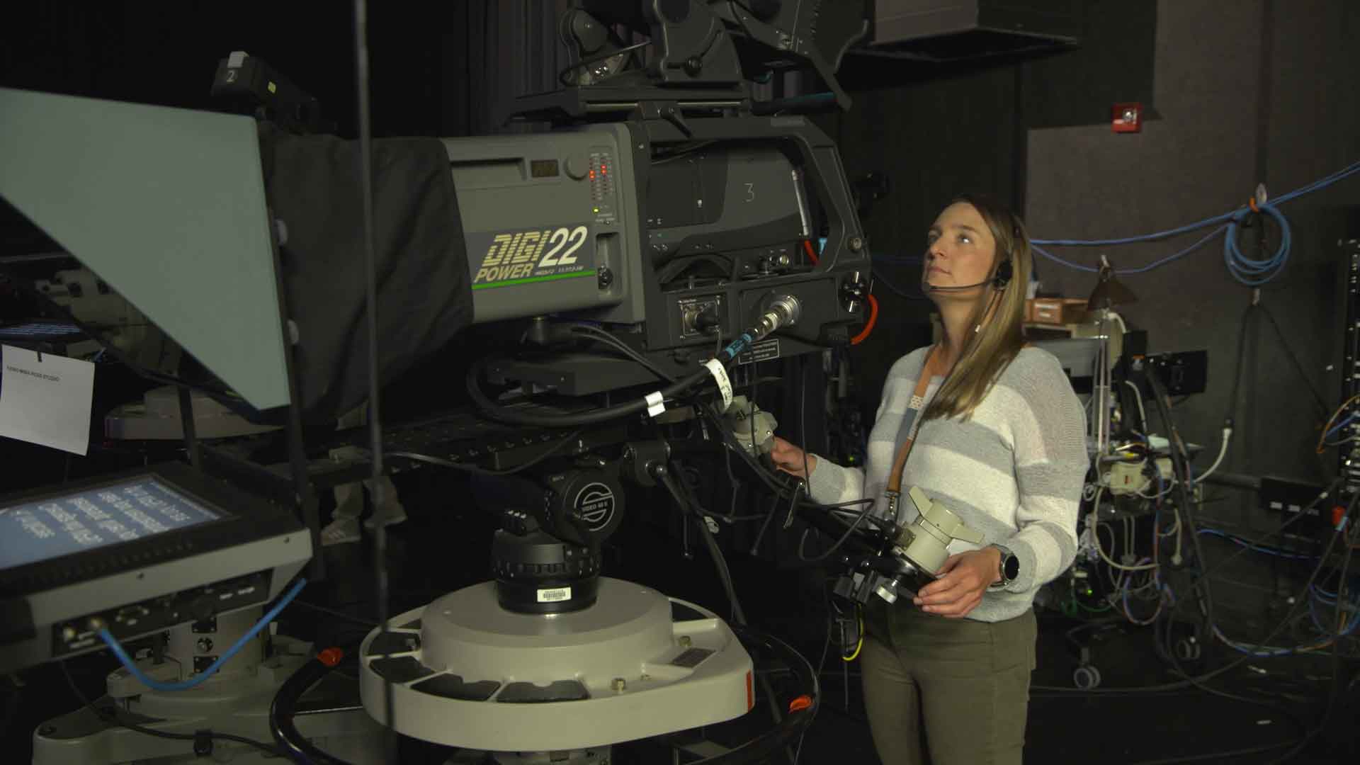 video technician operating television camera