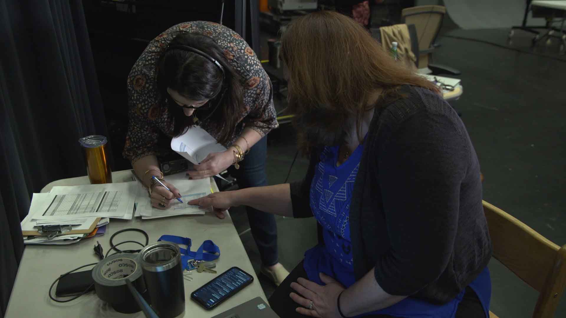 producer making notes on a script