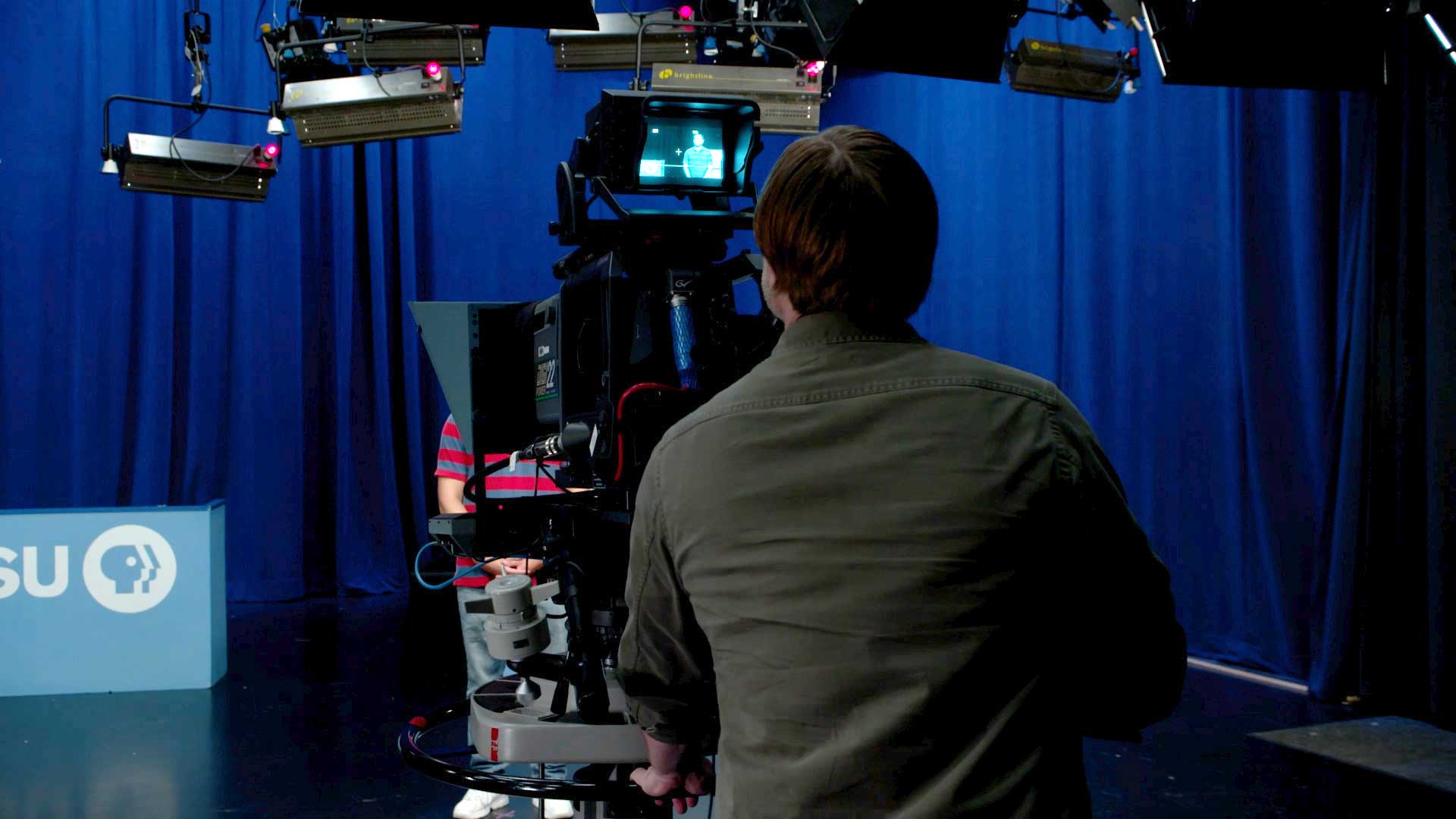 WPSU technician operating a studio tv camera